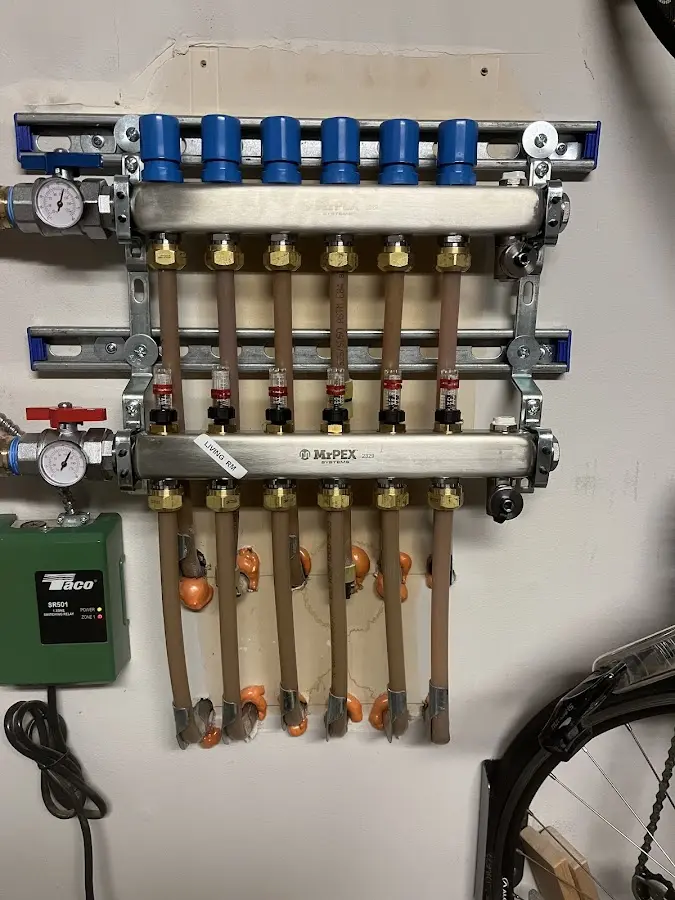 Plumber performing Sink Repair at a residential property in Maplewood